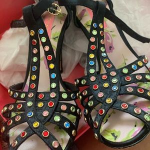 Carline black satin heel .